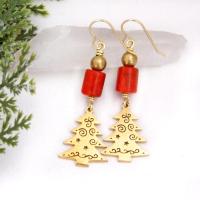These handmade earrings feature 18K gold plated Christmas tree charms with a whimsical cut-out pattern of spirals and swirls. They are accented with red coral and gold brass beads. Full of holiday charm, they'll make a great Christmas / holiday gift for women of all ages. Earrings are lightweight and comfortable to wear. 