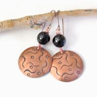 These handcrafted copper dangle earrings have a hand stamped texture and are accented with natural black onyx gemstones. They have a classic modern style that coordinates with all wardrobe types. They'll make a great gift for couples celebrating their 7th wedding anniversary - copper is the traditional metal and onyx is the traditional gemstone for this occasion.