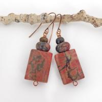 Small and petite, but full of earthy charm - these one-of-a-kind earrings feature natural red creek jasper stones topped off with smaller red creek jasper beads. The stones have a natural pattern in earthy hues of mossy greens, brick red and orange. Great colors for your fall wardrobe - or any time of year! They'll make a great gift for anyone that loves natural stones.