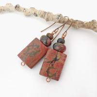 Small and petite, but full of earthy charm - these one-of-a-kind earrings feature natural red creek jasper stones topped off with smaller red creek jasper beads. The stones have a natural pattern in earthy hues of mossy greens, brick red and orange. Great colors for your fall wardrobe - or any time of year! They'll make a great gift for anyone that loves natural stones.