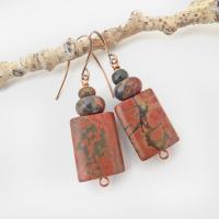 Small and petite, but full of earthy charm - these one-of-a-kind earrings feature natural red creek jasper stones topped off with smaller red creek jasper beads. The stones have a natural pattern in earthy hues of mossy greens, brick red and orange. Great colors for your fall wardrobe - or any time of year! They'll make a great gift for anyone that loves natural stones.