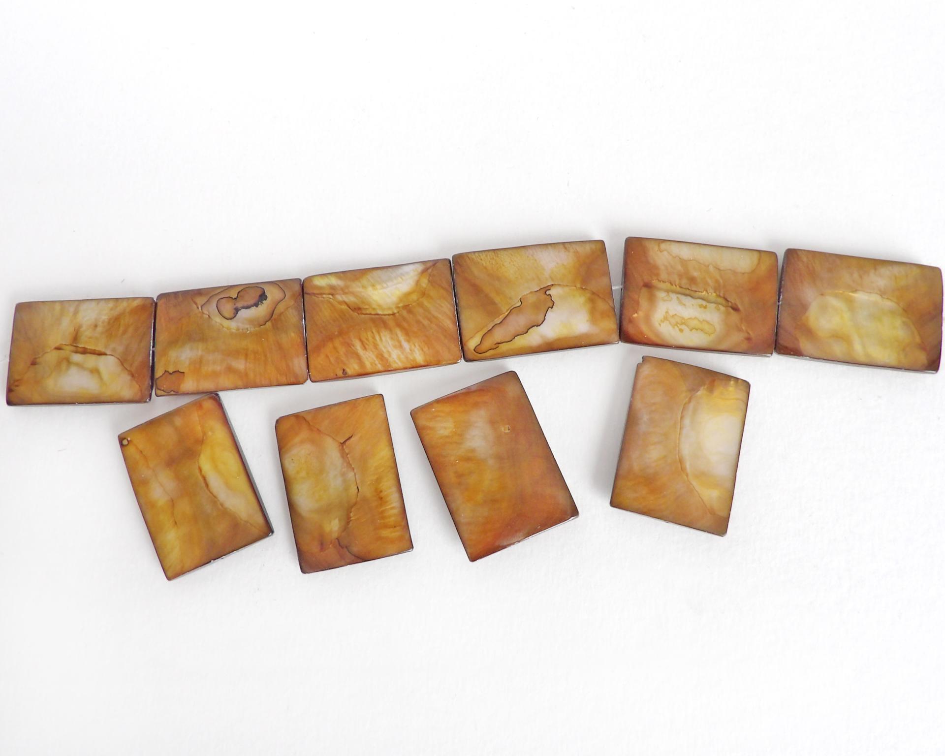 Beautiful Golden Mother of Pearl beads for jewelry making. Nice large rectangular size for pendants measuring approx. 1-3/8" in length and 1" width. Drilled top to bottom. Total of 10 pieces. 
