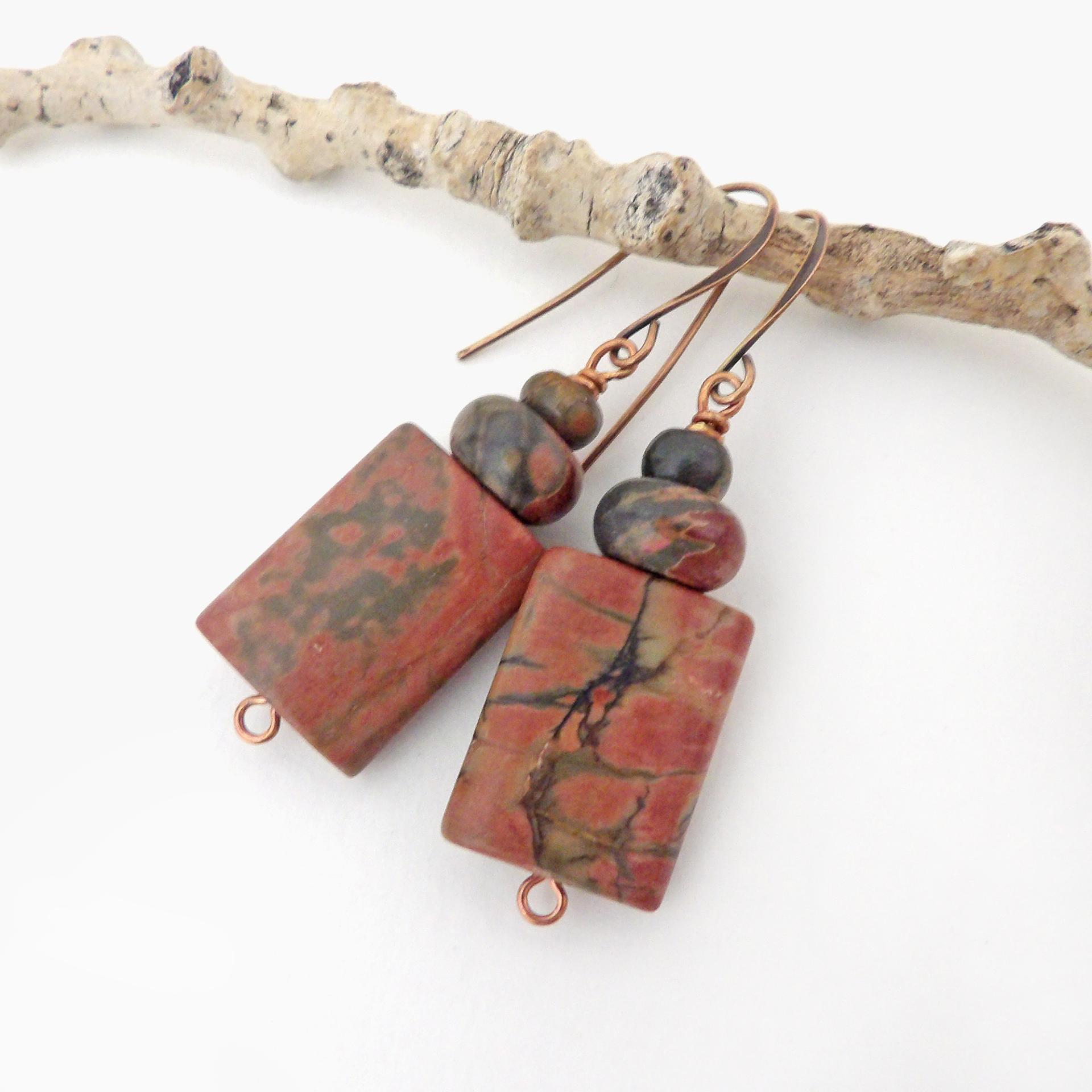 Small and petite, but full of earthy charm - these one-of-a-kind earrings feature natural red creek jasper stones topped off with smaller red creek jasper beads. The stones have a natural pattern in earthy hues of mossy greens, brick red and orange. Great colors for your fall wardrobe - or any time of year! They'll make a great gift for anyone that loves natural stones.