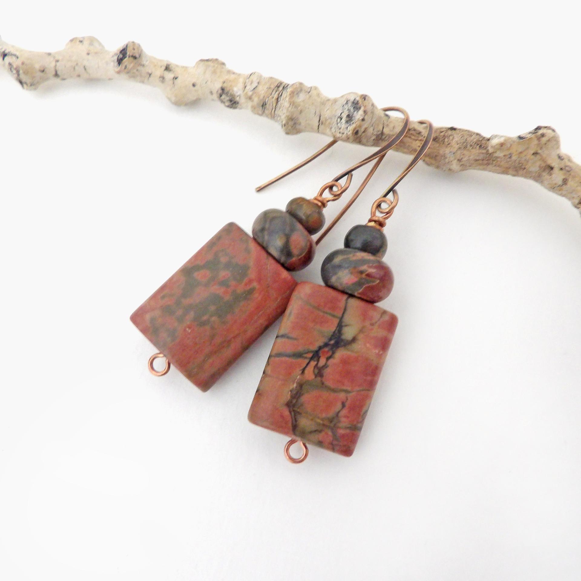 Small and petite, but full of earthy charm - these one-of-a-kind earrings feature natural red creek jasper stones topped off with smaller red creek jasper beads. The stones have a natural pattern in earthy hues of mossy greens, brick red and orange. Great colors for your fall wardrobe - or any time of year! They'll make a great gift for anyone that loves natural stones.